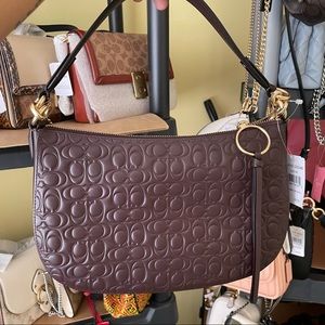 Coach Sutton signature leather crossbody